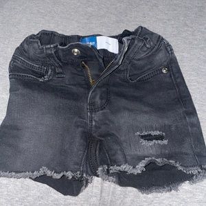Black denim shorts.